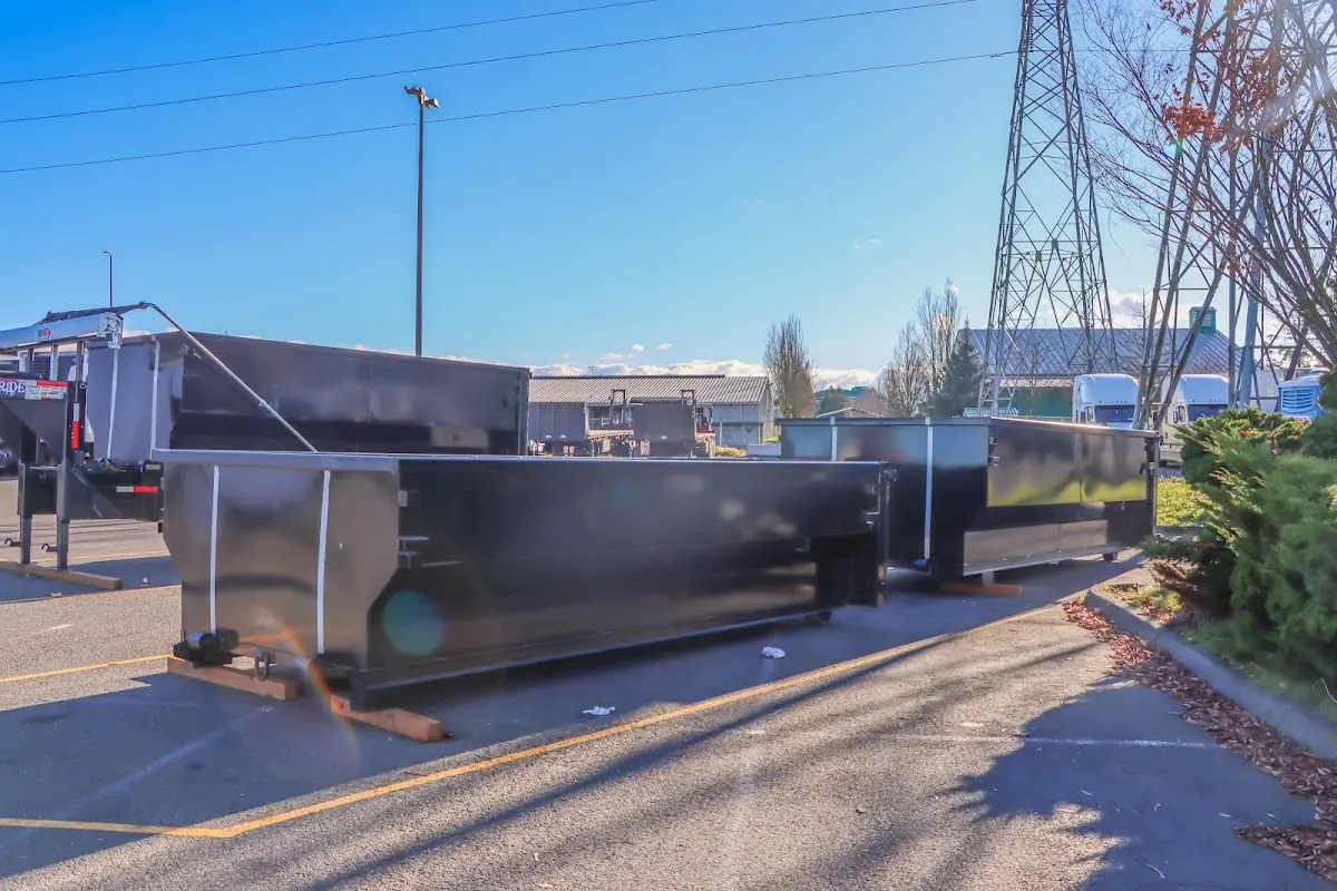 Roll-off dumpster ready for waste disposal at job site for Construction Dumpster Rental in Moores Mill